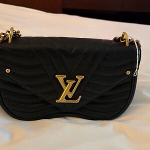 Louis Vuitton Black Quilted Shoulder Bag with Gold LV Accent